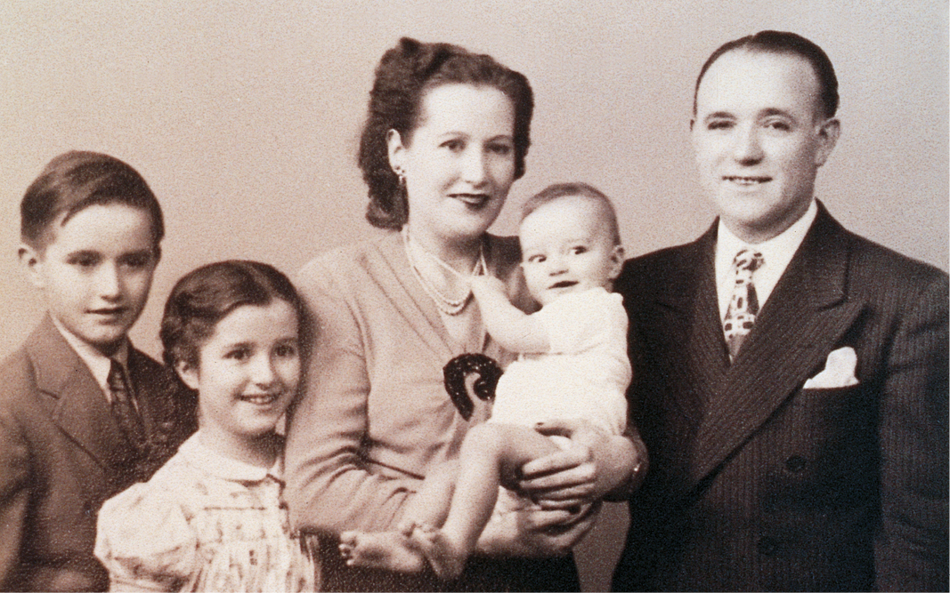 Sepia tone image of Mario and Mary Trinchero with their young children Bob, Vera, and Roger Trinchero.