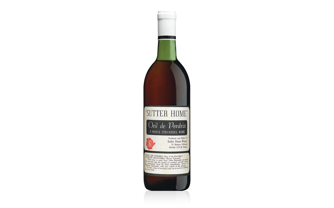 Color image of an original bottle of Sutter Home Winery White Zinfandel under the first label as Oeil de perdrix.